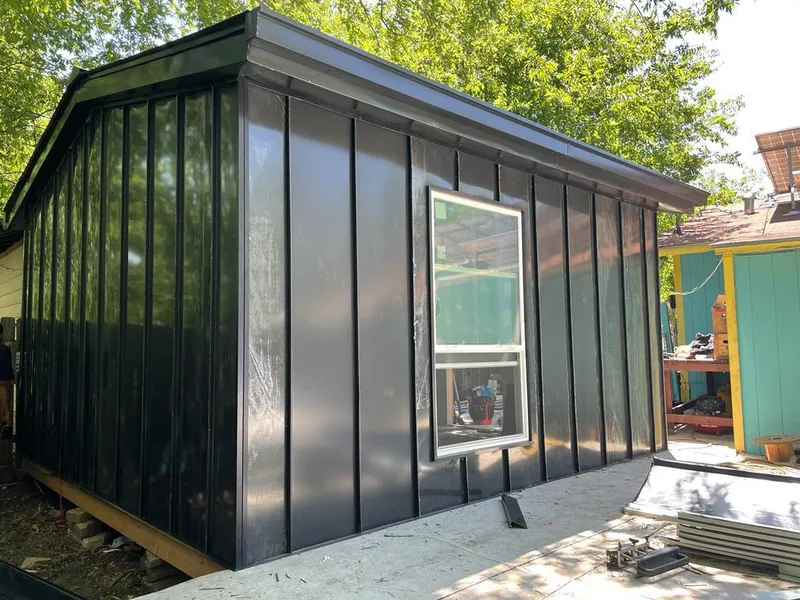 Black standing seam metal wall panels for Metal Roof Installation in New Carlisle