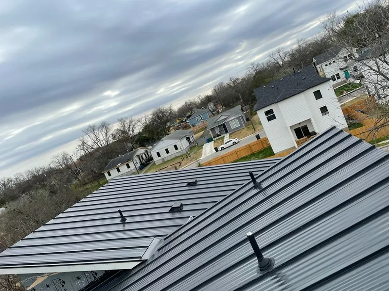 Standing seam metal roof panels with vents for Skylight Repair in New Carlisle
